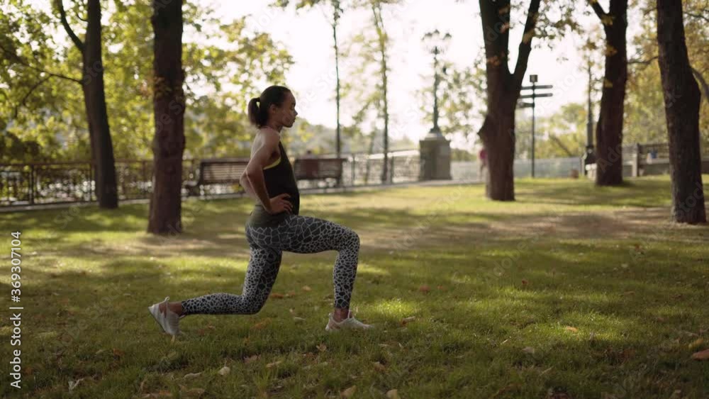sports girl does exercises for legs and buttocks. The girl does lunges. work on the press. 4K sports girl does exercises for legs and buttocks. The girl does lunges. work on the press. 4K