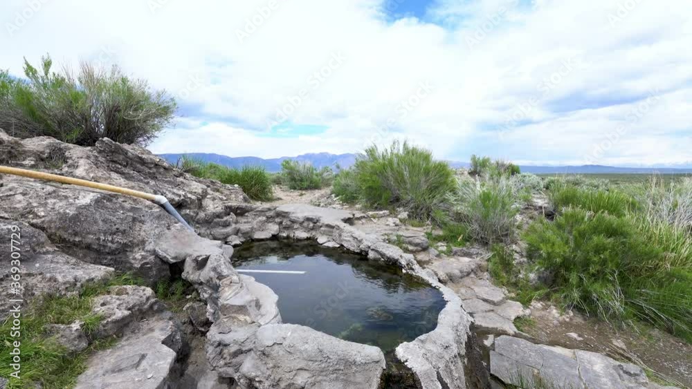 Cinematic tracking shot of hippie hot tub in Eastern Sierra, California Cinematic tracking shot of hippie hot tub in Eastern Sierra, California