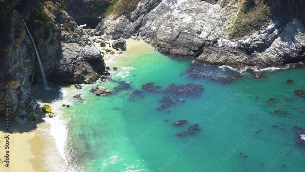 Telephoto shot of of McWay Falls at Julia Pfeiffer Burns State Park in Big Sur, California Telephoto shot of of McWay Falls at Julia Pfeiffer Burns State Park in Big Sur, California