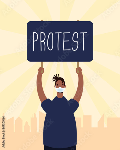 afro man wearing medical mask protesting with placard
