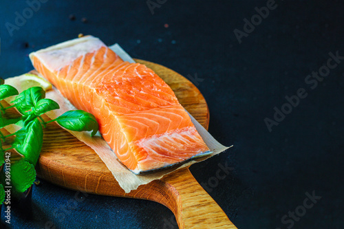 salmon slice red fish seafood serving food background top view copy space healthy eating raw keto or paleo pescetarian diet 