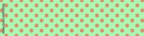 Christmas seamless pattern with snowflakes on pastel green background. Winter background with snowfall. Endless Christmas Pattern. Long wide banner.