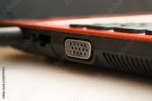 VGA connector in notebook close up. Ports to laptop