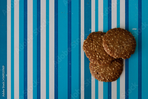 3 cookies on a striped background