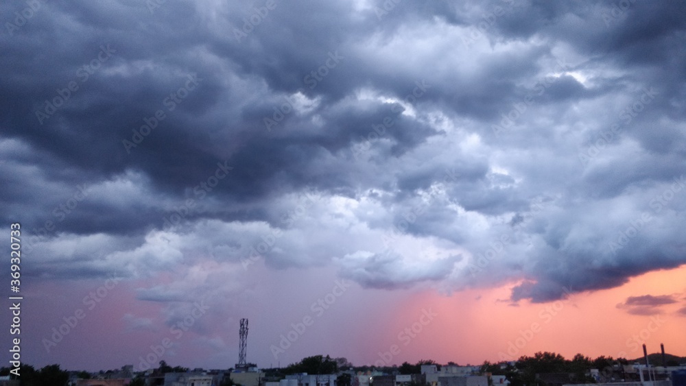 Rain pouring down at a distance in the evening Rain pouring down at a distance in the evening