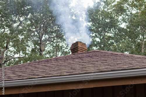 roof with chimney and smoke
