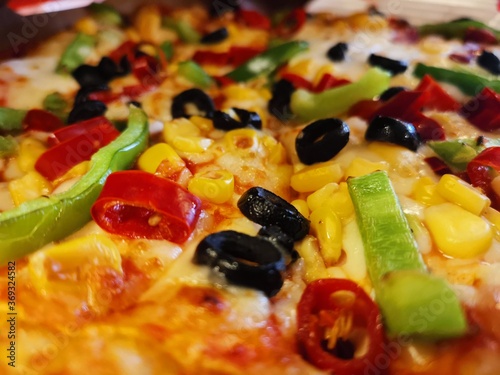 Closeup shot of deliciously baked pizza