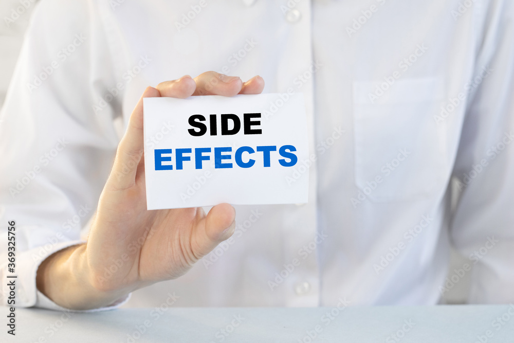 Doctor holding a card with text Side effects medical concept Doctor holding a card with text Side effects medical concept