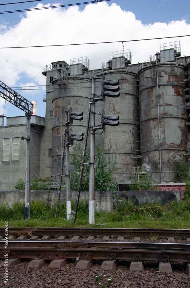 Obraz premium Cement factory background. Old gray factory.
