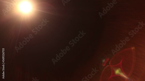 Easy to add lens flare effects for overlay designs or screen blending mode to make high-quality video. Abstract sun burst, digital flare, iridescent glare over black background.