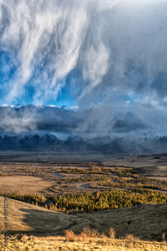 The landscape of Altai mountains with North-Chuya ridge in background, in autumn, Siberia, Altai mountain Republic, Russia.
