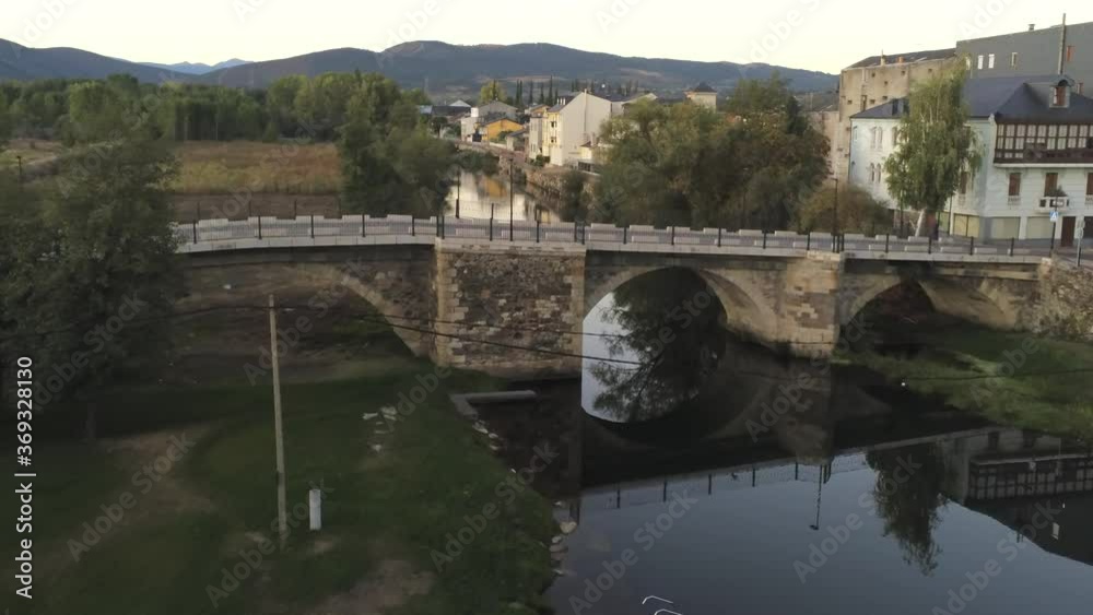 River and bridge in Cacabelos, village of Leon. Spain. Camino de Santiago. Aerial Drone Footage River and bridge in Cacabelos, village of Leon. Spain. Camino de Santiago. Aerial Drone Footage
