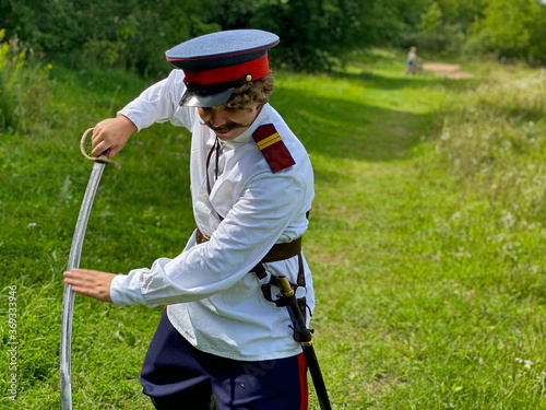 Actor in a Don Cossack costume on the set. photo