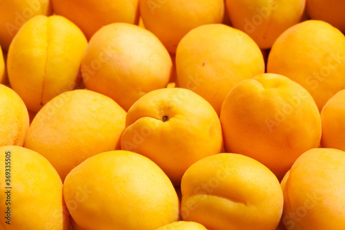 Ripe fresh apricots fruit background