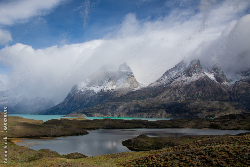 Clouds running through the great Kuernos of Torres del Paine