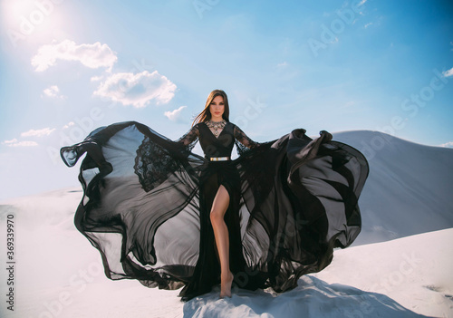 Fotografie Beautiful sexy woman queen in black clothes