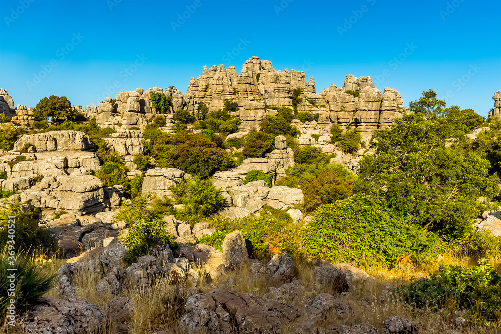 A view of the weathered limestone structures in the Karst landscape of El Torcal near to Antequera, Spain in the summertime