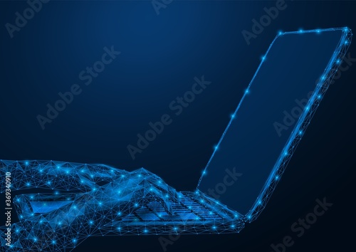 Work or online training on a personal computer. Low-poly hands of a person working on a laptop. Blue background.
