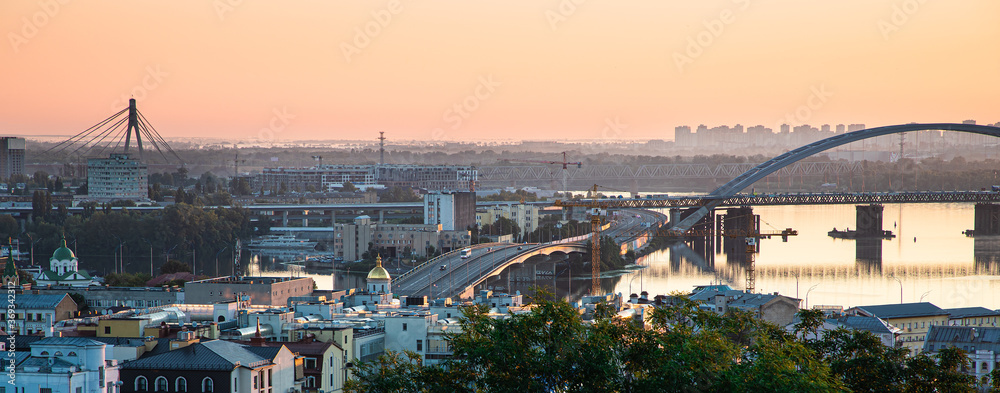 View of the Podol district of the city Kyiv on the sunrise