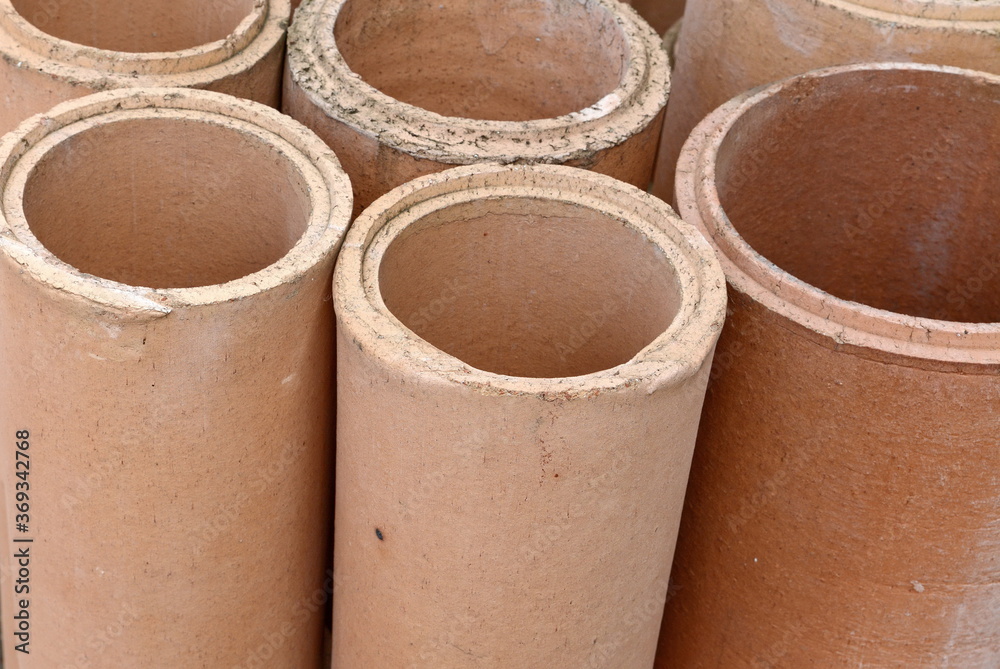 chamotte pipes for chimneys. modular chimney, close-up chamotte pipes for chimneys. modular chimney, close-up