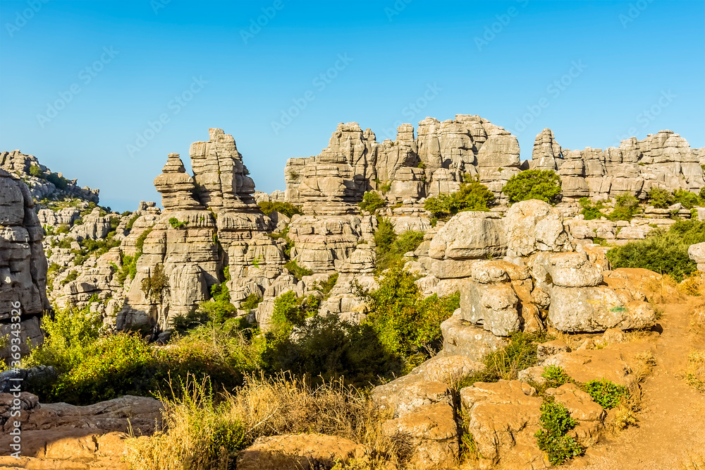 Walls of weathered limestone in the Karst landscape of El Torcal near to Antequera, Spain in the summertime