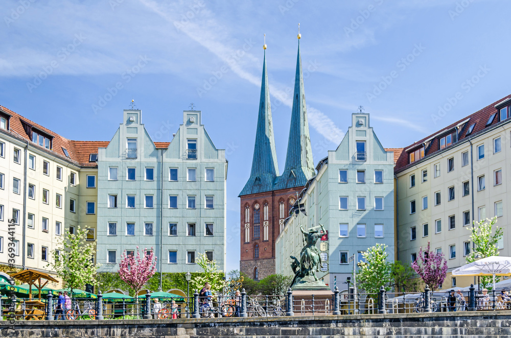 Nikolaiviertel  (Nicholas' Quarter) with historic houses, Nikolaikirche,  skulpture of St.George and its famous traditional German restaurants
