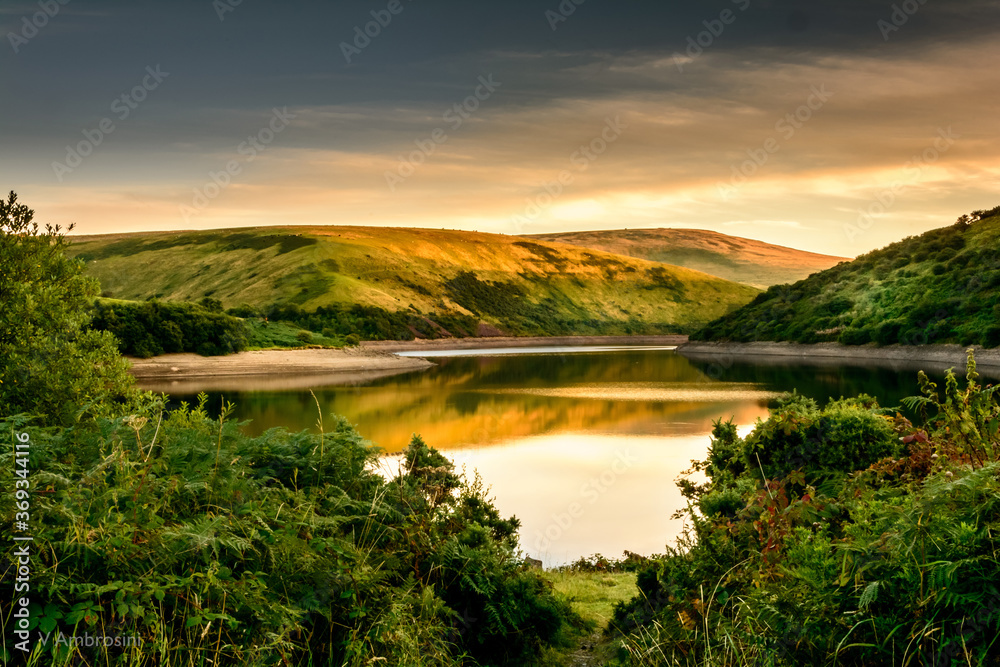 A view of Meldon reservoir during a quiet summer evening in Dartmoor, England