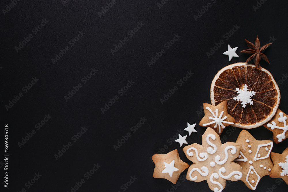 Winter holidays celebration atmosphere, Christmas and New Year design template. Composition with festive embellishments, homemade gingerbread cookies and decorations Winter holidays celebration atmosphere, Christmas and New Year design template. Composition with festive embellishments, homemade gingerbread cookies and decorations