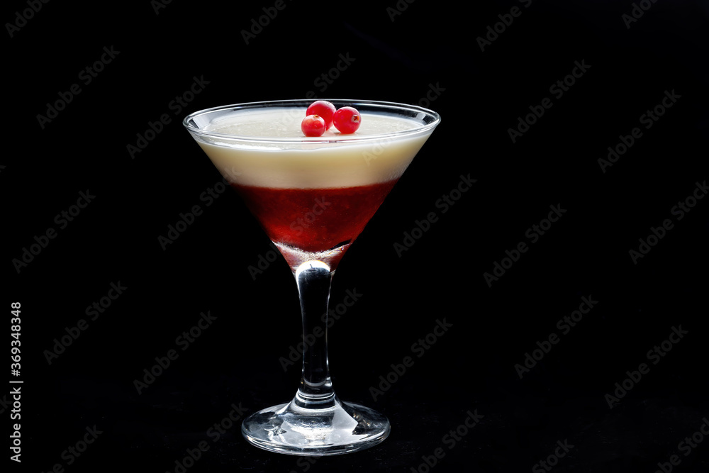 Berry and milk jelly in a champagne glass. Berry and milk jelly in a champagne glass.