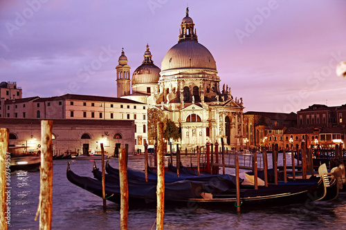Beautiful view on gondolas and cathedral in venice on sunset © Kseniia