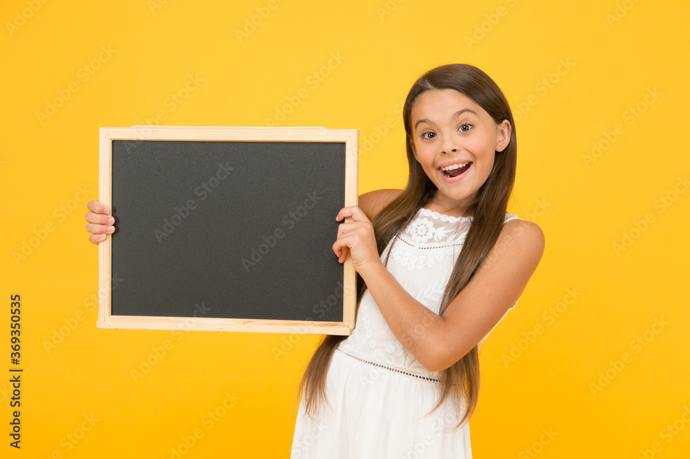 Good news for you. Chalkboard for information. Blank blackboard. Something you need to know. Happy smiling girl hold blackboard. Small kid with blank blackboard. Advertisement promotion copy space Good news for you. Chalkboard for information. Blank blackboard. Something you need to know. Happy smiling girl hold blackboard. Small kid with blank blackboard. Advertisement promotion copy space