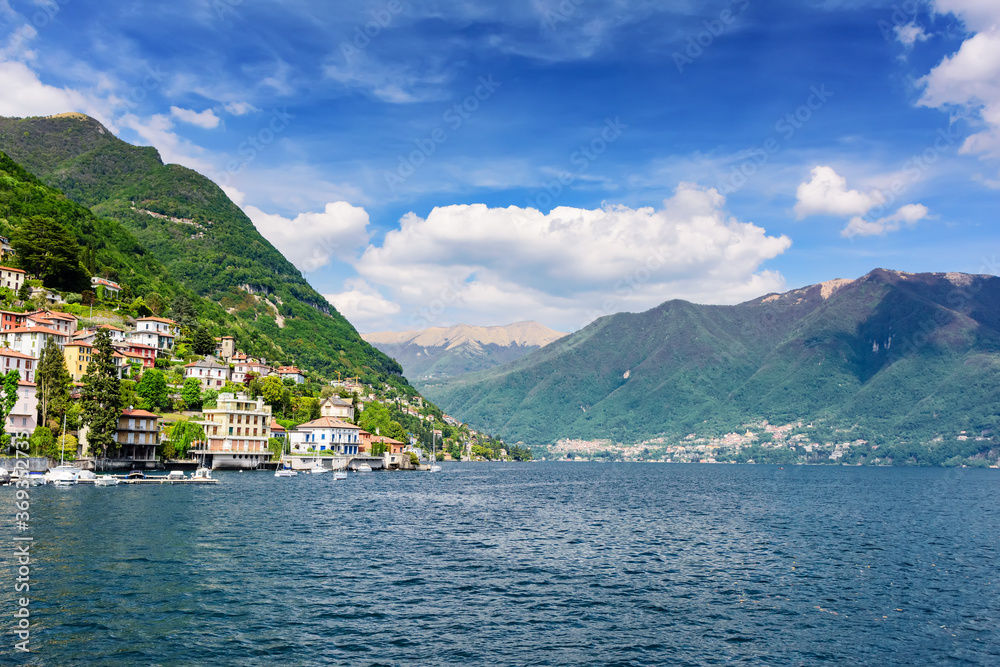 Lake Como view of the surrounding mountains and coastal cities. Italy