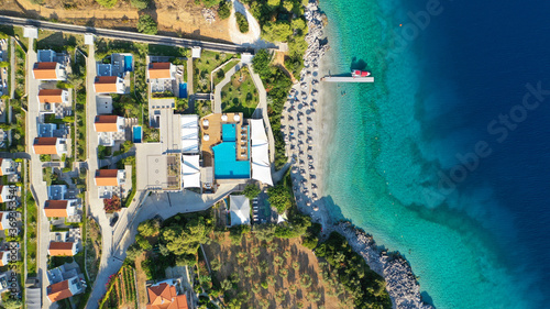 Aerial drone photo of beautiful tranquil turquoise beach of Antrines near famous Panormos beach, Skopelos island, Sporades, Greece photo