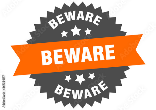 beware round isolated ribbon label. beware sign