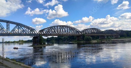 Old train bridge over Vistula River in Torun, Poland.