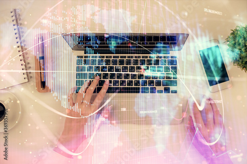 Wallpaper Mural Double exposure of woman hands working on computer and financial theme hologram drawing. Top View. Business concept. Torontodigital.ca