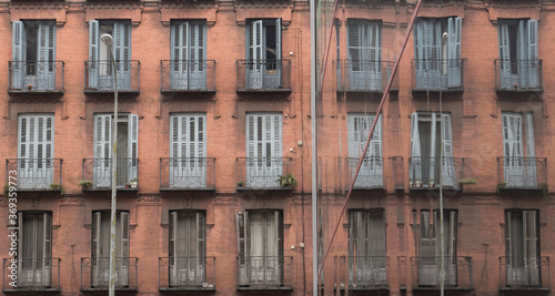 old balconies with mirror wooden shutters