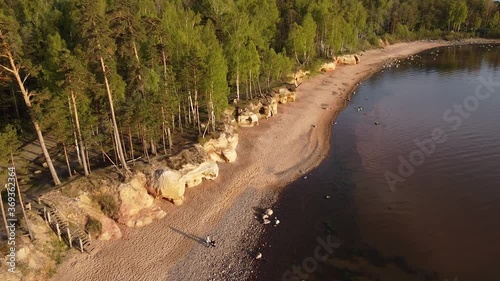 Red sandstone cliffs at Baltic sea coast Veczemju klintis aerial view photo