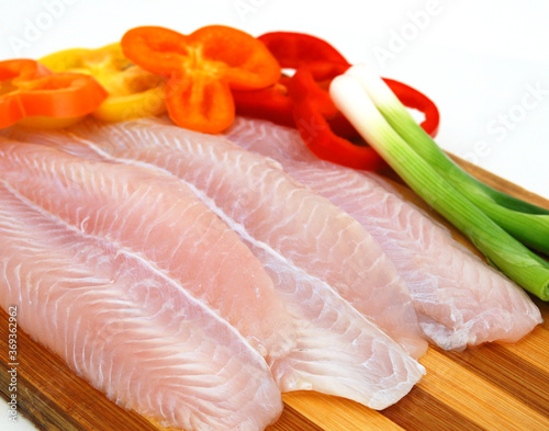 Fillet of Fish Pangasius. Isolated on white background.