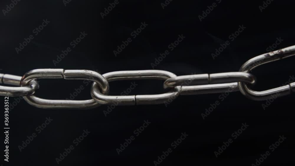 Weakest Link - Concept - Real Chain slowly heats up and starts to sparkle, then the weakest link finally breaks and then the rest of the chain breaks. Weakest Link - Concept - Real Chain slowly heats up and starts to sparkle, then the weakest link finally breaks and then the rest of the chain breaks.