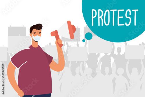 man wearing medical mask protesting with megaphone