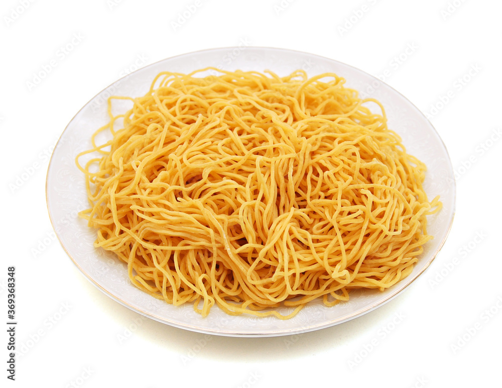 Italian spaghetti in plate isolated on white Italian spaghetti in plate isolated on white