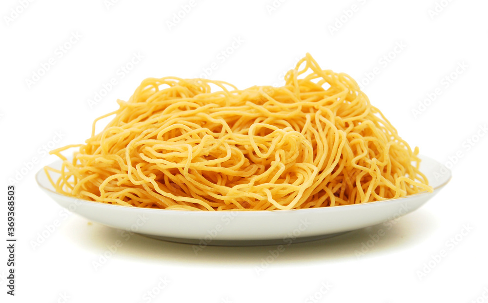 Italian spaghetti in plate isolated on white Italian spaghetti in plate isolated on white