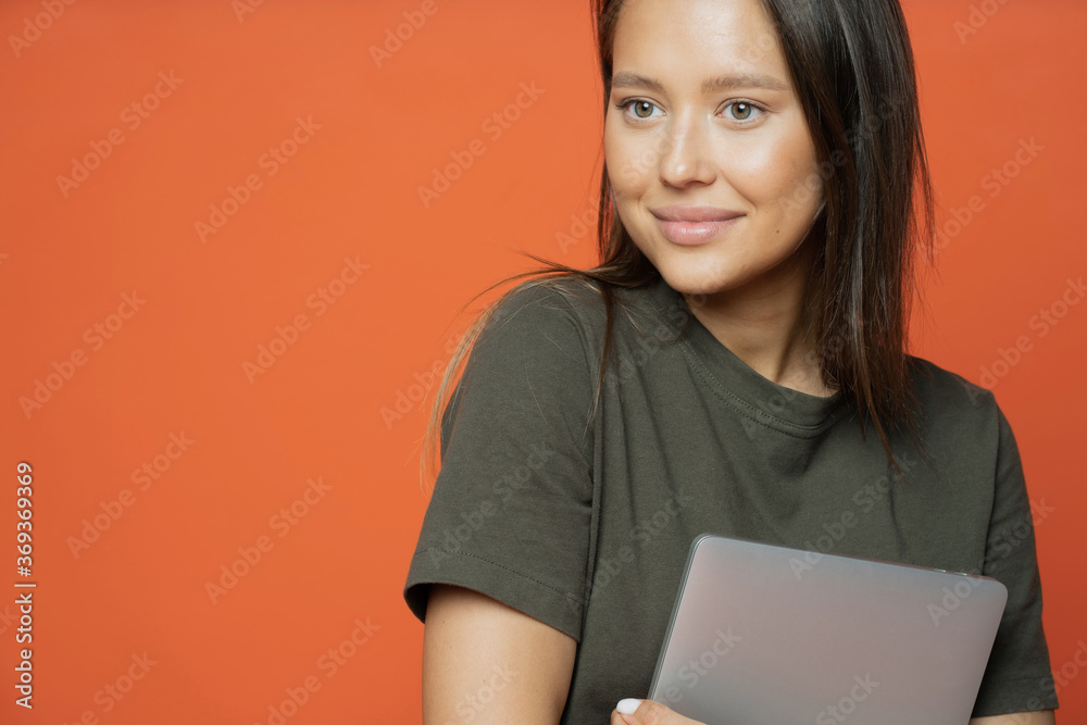 Naklejka premium young woman with laptop computer