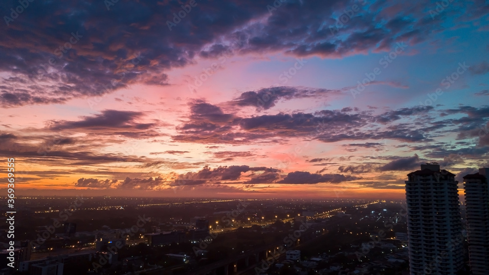 Fototapeta premium Background of colorful sky concept: Dramatic sunset with twilight color sky and clouds.