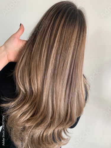 woman combing her hair