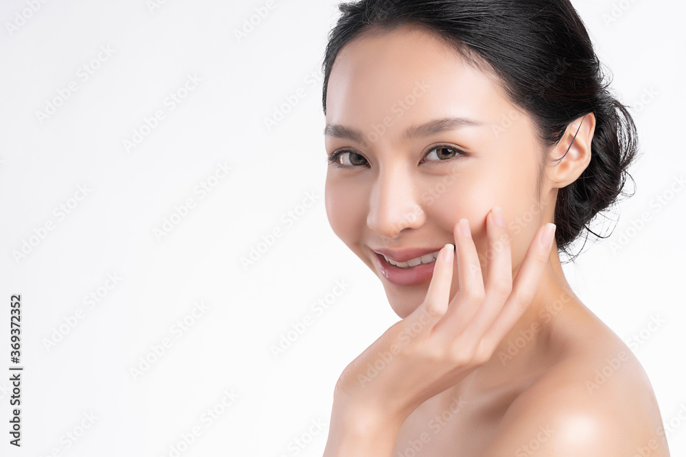 Beautiful Young asian Woman with Clean Fresh Skin on white background, Face care, Facial treatment, Cosmetology, beauty and spa, Asian women portrait Beautiful Young asian Woman with Clean Fresh Skin on white background, Face care, Facial treatment, Cosmetology, beauty and spa, Asian women portrait