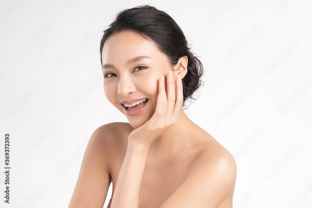 Beautiful Young asian Woman with Clean Fresh Skin on white background, Face care, Facial treatment, Cosmetology, beauty and spa, Asian women portrait Beautiful Young asian Woman with Clean Fresh Skin on white background, Face care, Facial treatment, Cosmetology, beauty and spa, Asian women portrait