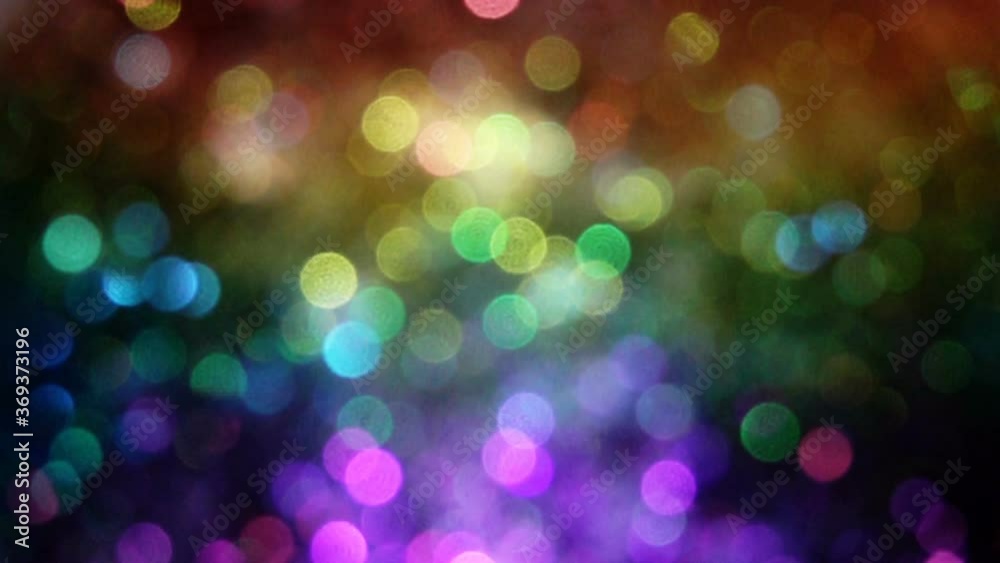 Rainbow bokeh glitter / sparkle / particle explosion background texture / shot in slow motion at 960fps