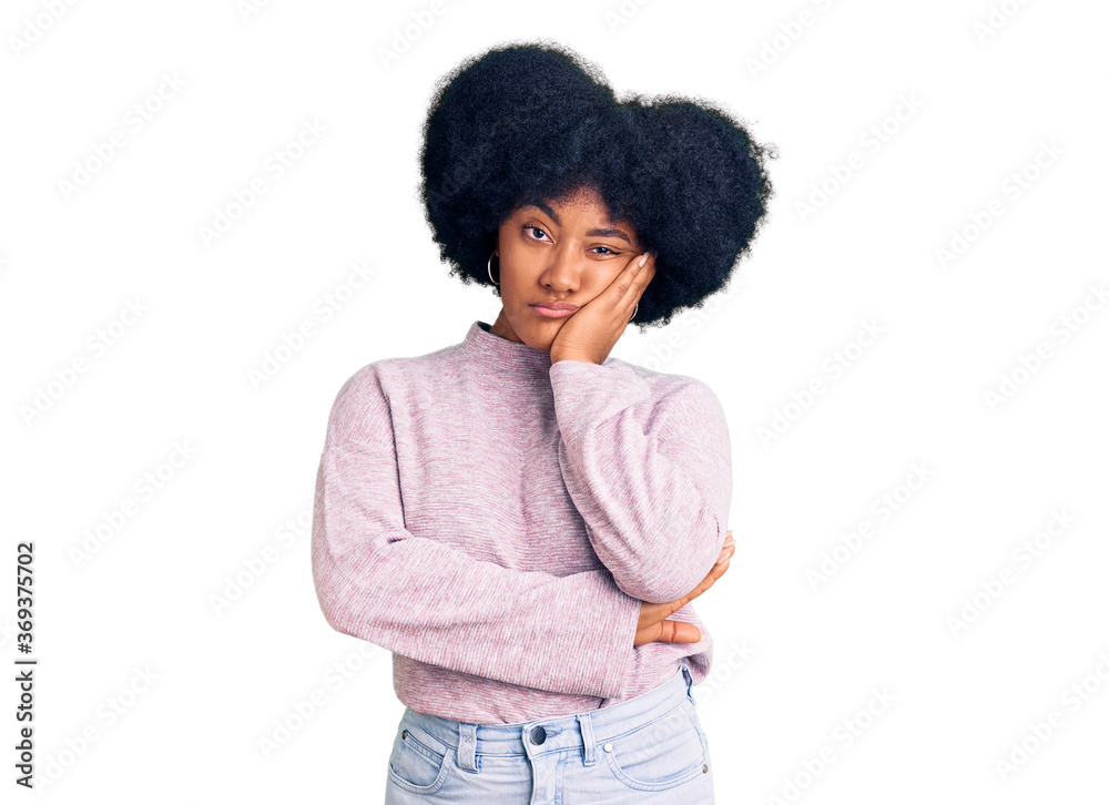 Young african american girl wearing casual clothes thinking looking tired and bored with depression problems with crossed arms. Young african american girl wearing casual clothes thinking looking tired and bored with depression problems with crossed arms.